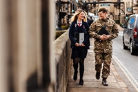 Description: Stamford School, CCF boy wearing uniform and girl wearing school uniform walking...