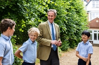 Description: Mr Barber with some boys